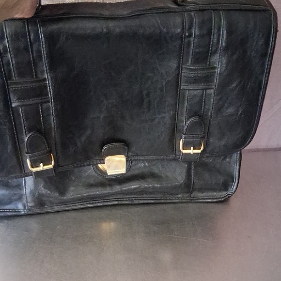 Black Leather Briefcase with Gold Clasp By Daniella Bags.